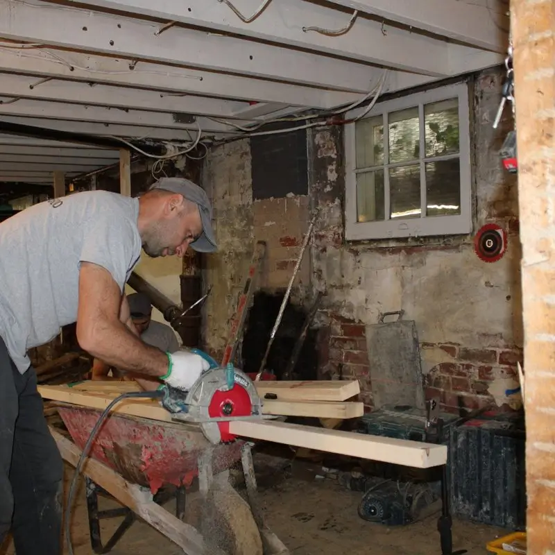 underpinning contractor doing formwork for concrete pins
