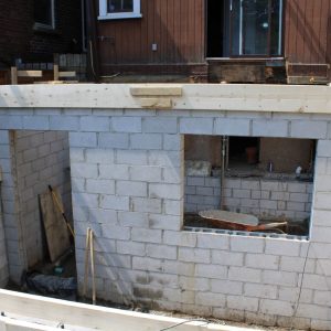 shoveling drainage gravel weeping tile