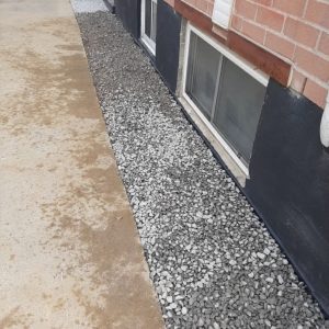 exterior trench gravel backfill foundation drainage