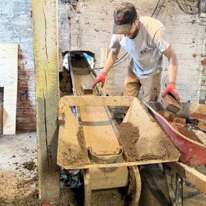 structural floor drop dirt removal system